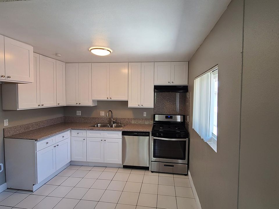 Fully remodeled kitchen! Brand new cabinets. Granite Countertops. New Gas Range and New Stainless Steel Dishwasher.
