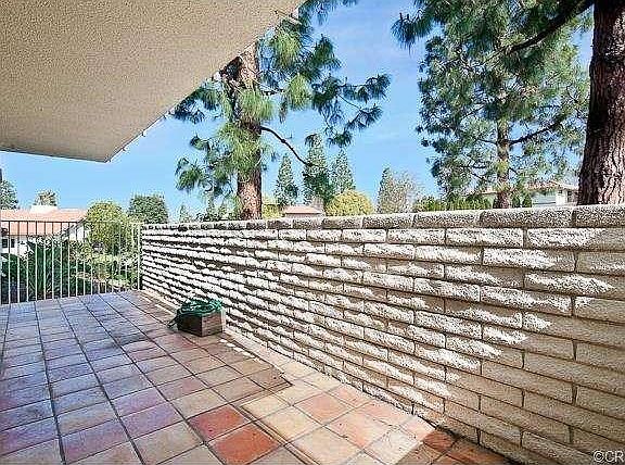 ENCLOSED PAVER STONE PATIO