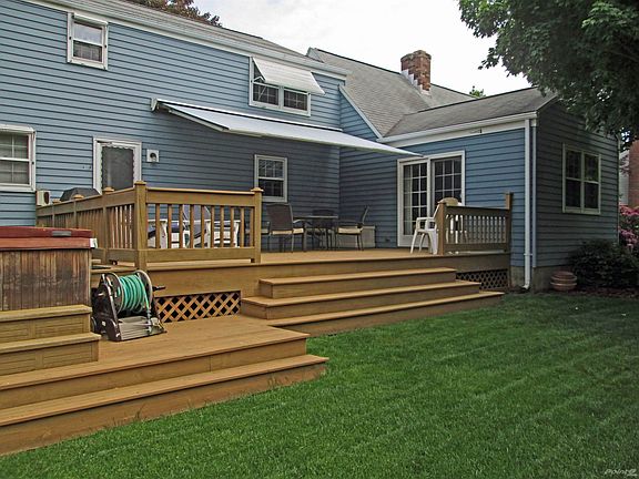 Entertain or just relax on this spacious 27'x18' deck, complete with hot tub.