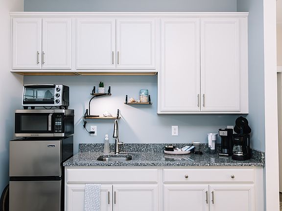 Dishware, silverware and cooking utensils are included. Dish towels and drain pad included.