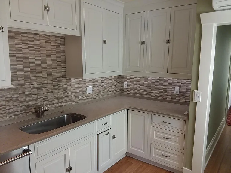 Kitchen with sink and custom cabinets