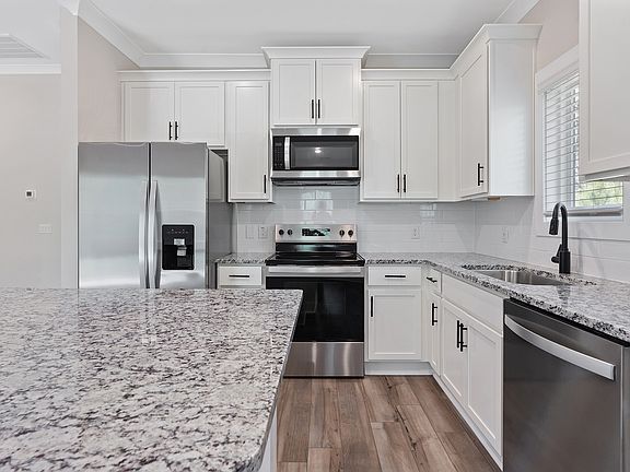 The kitchen has granite countertops