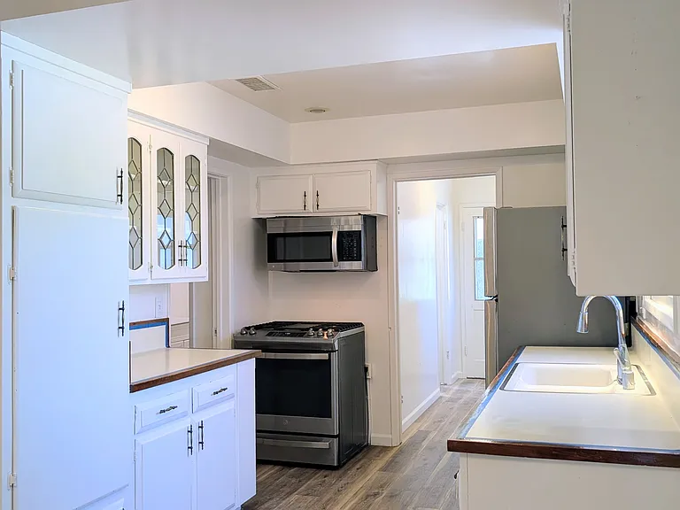 Kitchen with ample cabinets