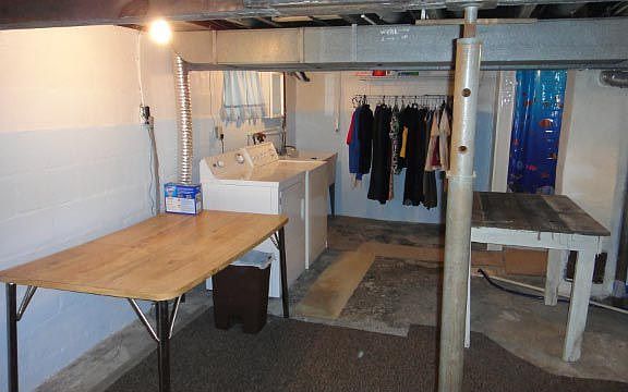 Basement with full bath, laundry and extra storage
