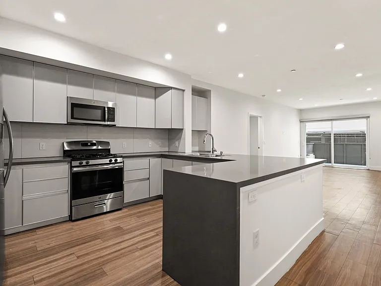 Full-Size Kitchen with Countertop Bar