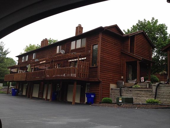 224 is the tri-level end unit farthest to the right in this photo. Oversized deck in the rear immediately off the main living room. Large 1 1/2-car private garage in the lower level contains additional storage space.