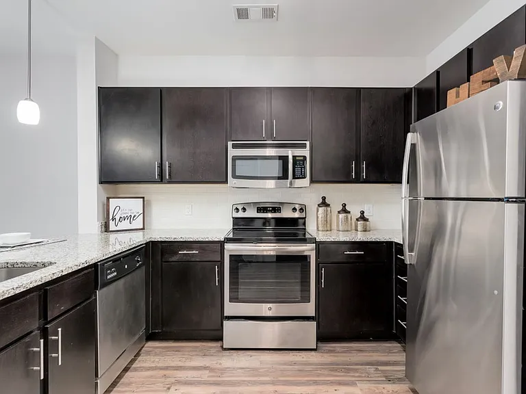 The Melrose Apartments in Nashville offer modern kitchens with sleek finishes, contemporary design, and stainless steel appliances.