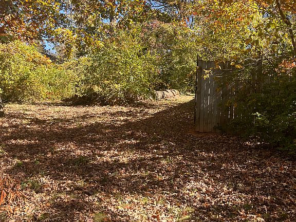 The back yard is fenced it, but the side yard is not.