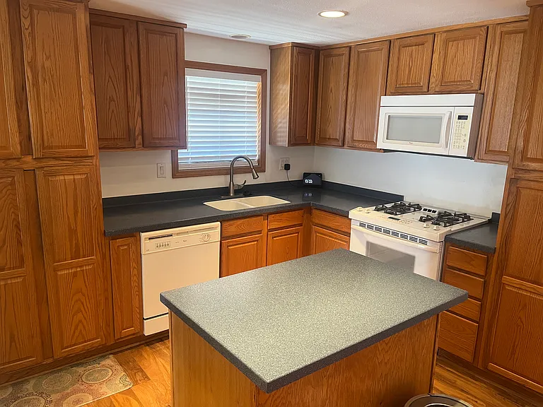 Kitchen 1 with stove, dishwasher, microwave, garbage disposal