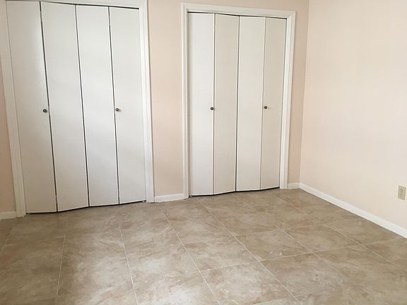 2nd Bed with tile floor throughout