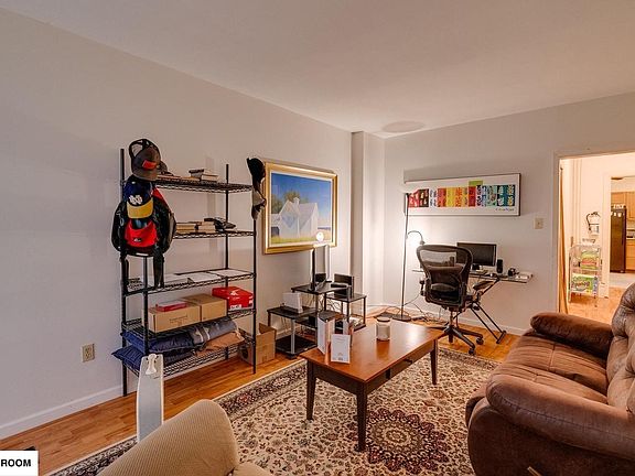 Living Room with large couches and furniture for scale.