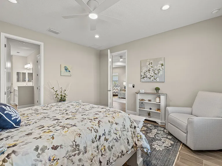 Entry to private primary bathroom and oversized walk-in closet.