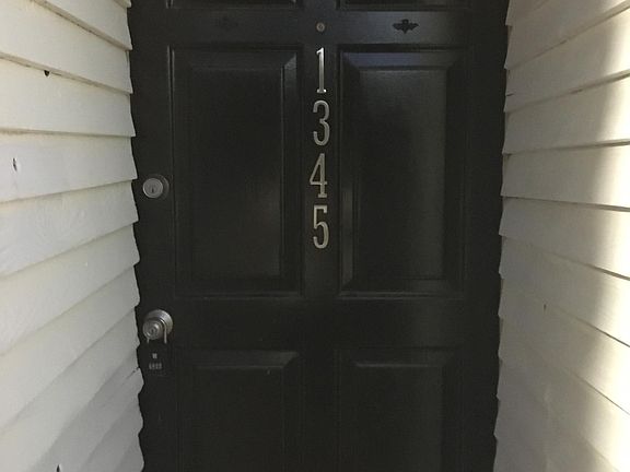 Front door, entrance to the apartment is inside to the left.