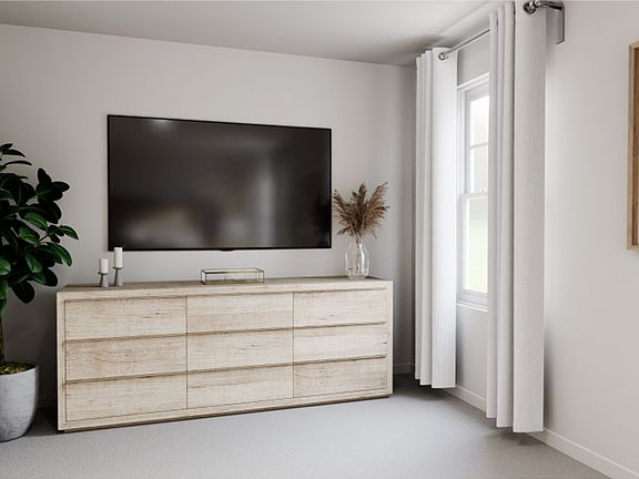 The owner's suite bedroom features flat screen TV pre-wiring