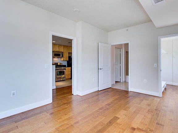 Spacious bedroom with view of Alexandria, Arlington, and DC