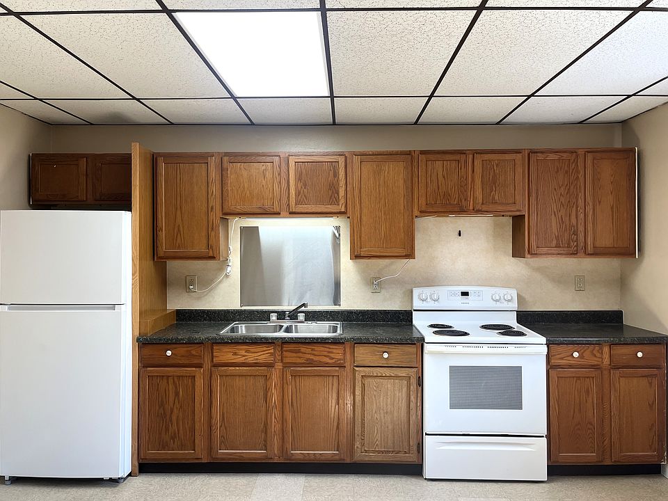 Large Eat-In Sized Kitchen! Stove and Refrigerator pictured are included. VCT flooring continues throughout.