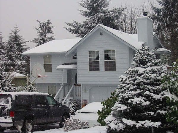 front of house in the winter