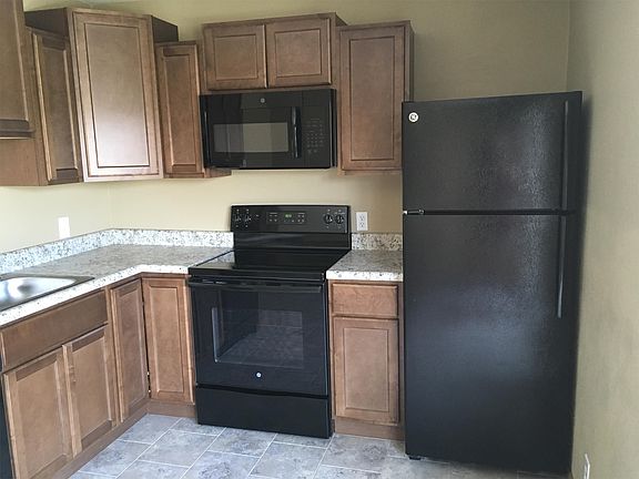 Kitchen has black appliances