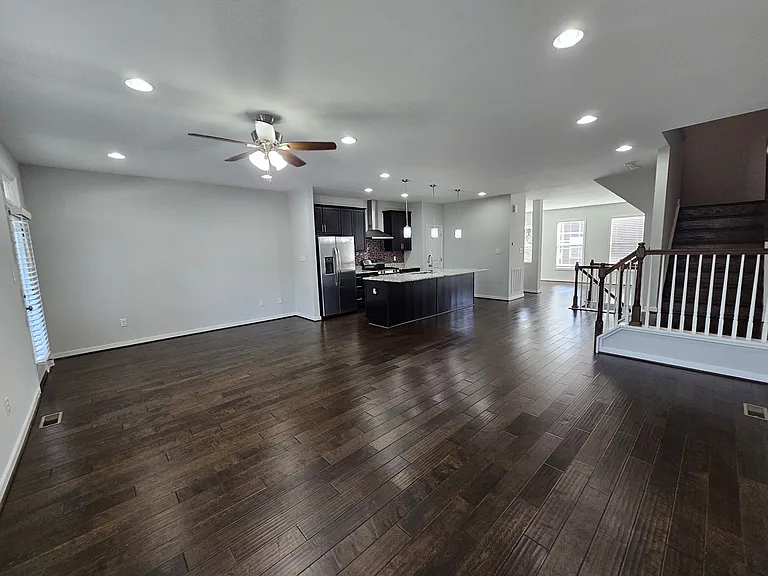 Main floor living room + stairs to bed room