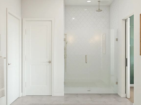 Primary bath with glass shower enclosure