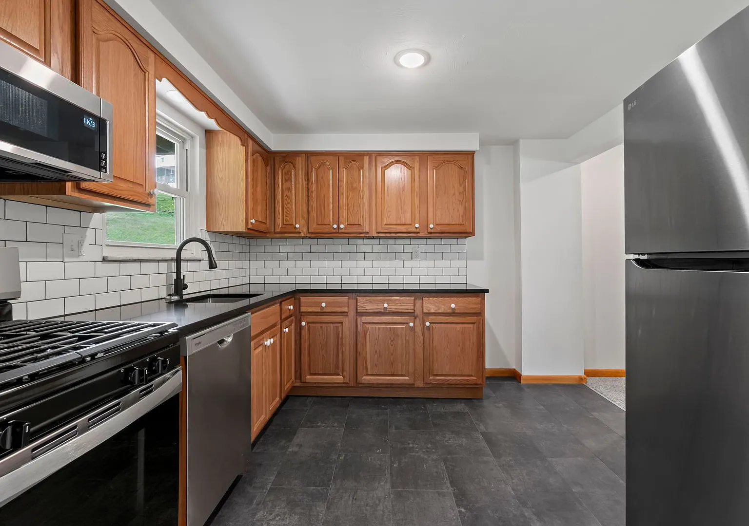 Ready For Move-In! Don't Miss This Renovated 2-Bedroom Townhome In West Mifflin! — Photo 1