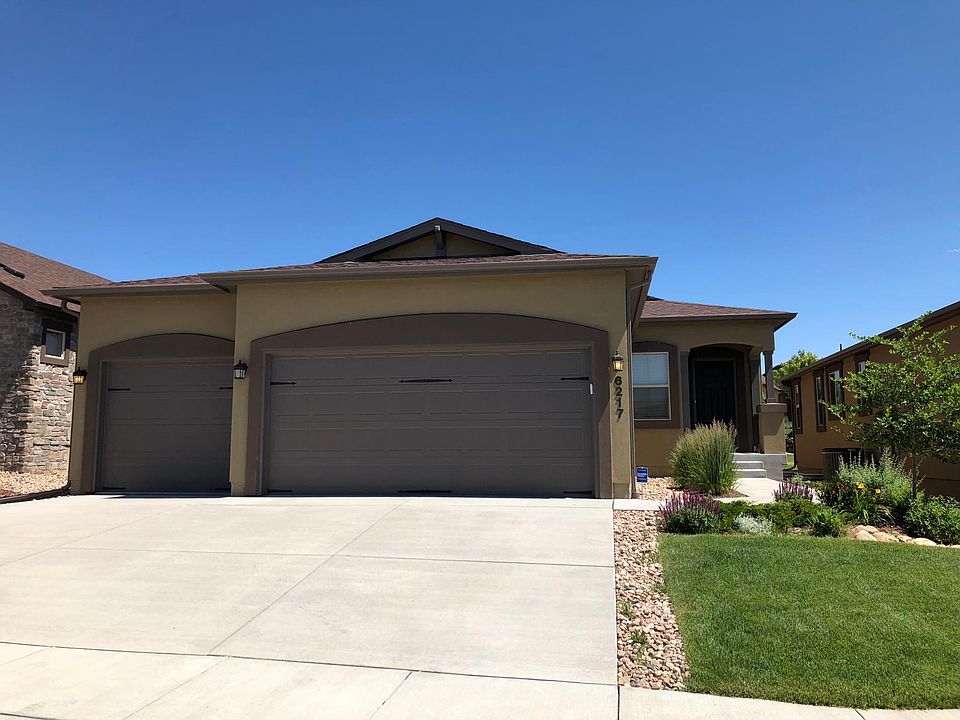 Exterior 3 car, stucco, lawn maintained and snow removal included