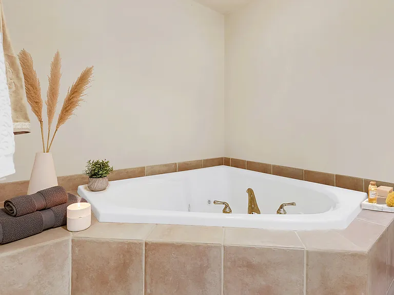 Primary tub with warm bubbly jets.
