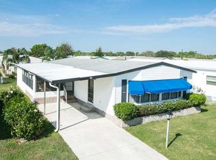 908 Hyacinth Cir, Barefoot Bay, FL 32976