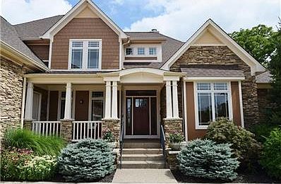 Beautiful entry to welcome you and your guests.  Leaded glass door and covered porch add to the design.