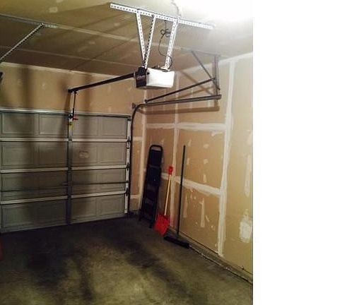 Oversized 1 car garage with electric door opener...