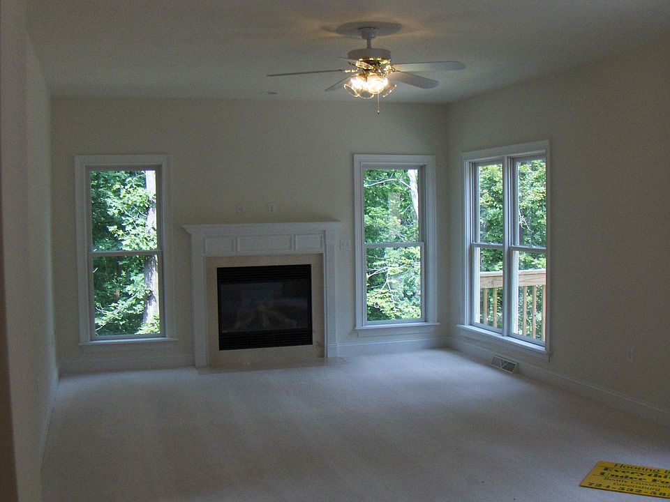 Main floor family room with wall of windows and views