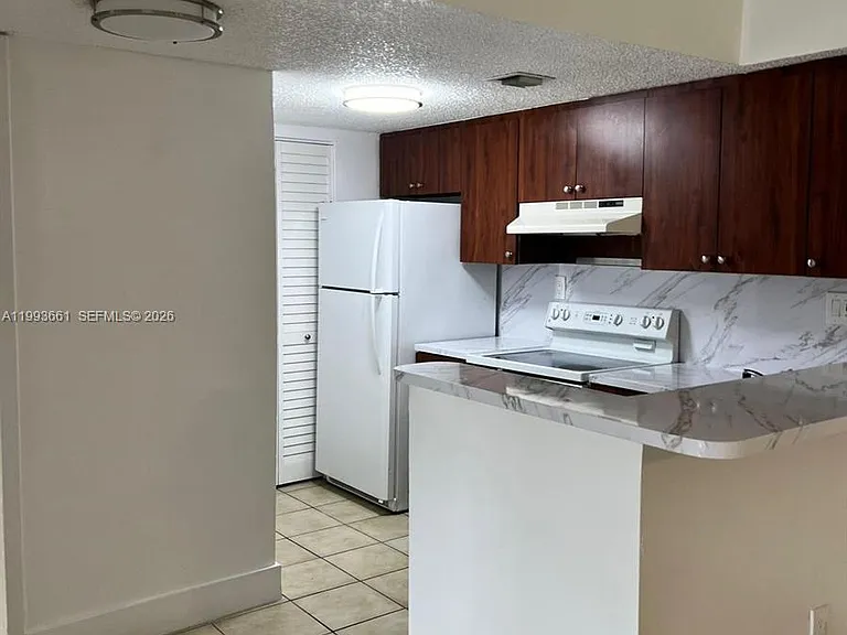 7595 NW 179th St #119 — Photo 15
