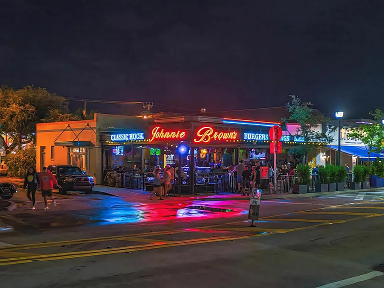 High-Energy Night Scene Featuring Music and Burgers at Johnnie Brown's