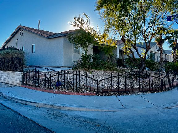 This property resides on the corner of Rustler Ridge Ave and Indigo Hill St.