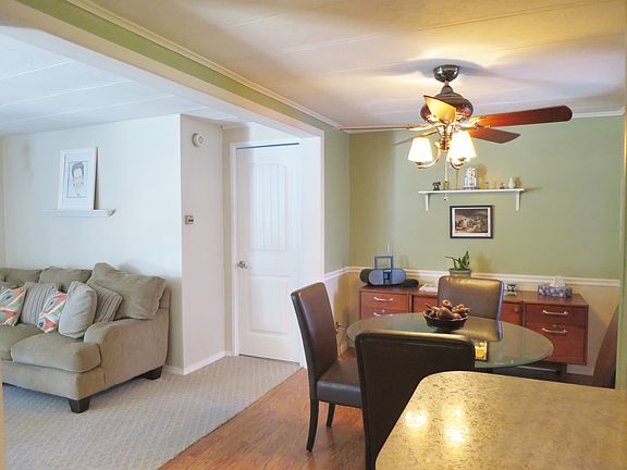 Kitchen and dining rms are open to the living rm