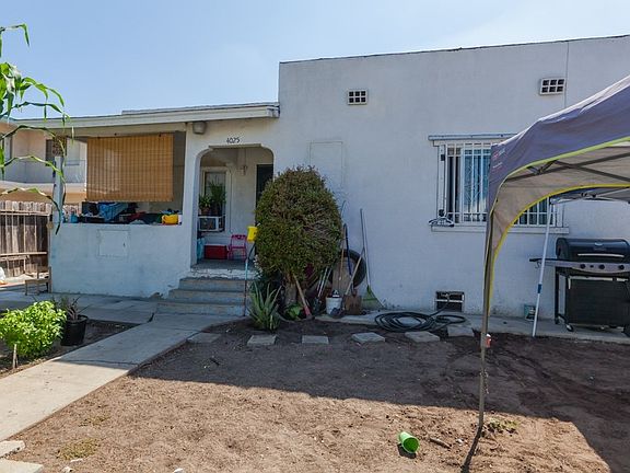 Front house with fully fenced in private use yard. Front deck.
