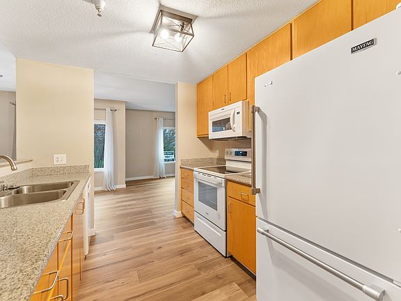 5th image of 10800 SE 17th Cir Unit A1