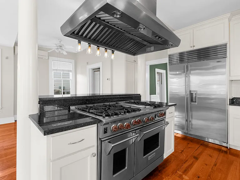 Kitchen with Wolf Gas Stove & Two Ovens and Subzero Refrigerator