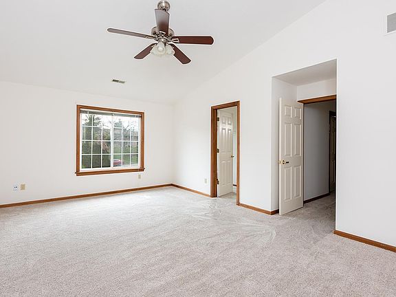 Bedroom with walk in closet access to the large bathroom.