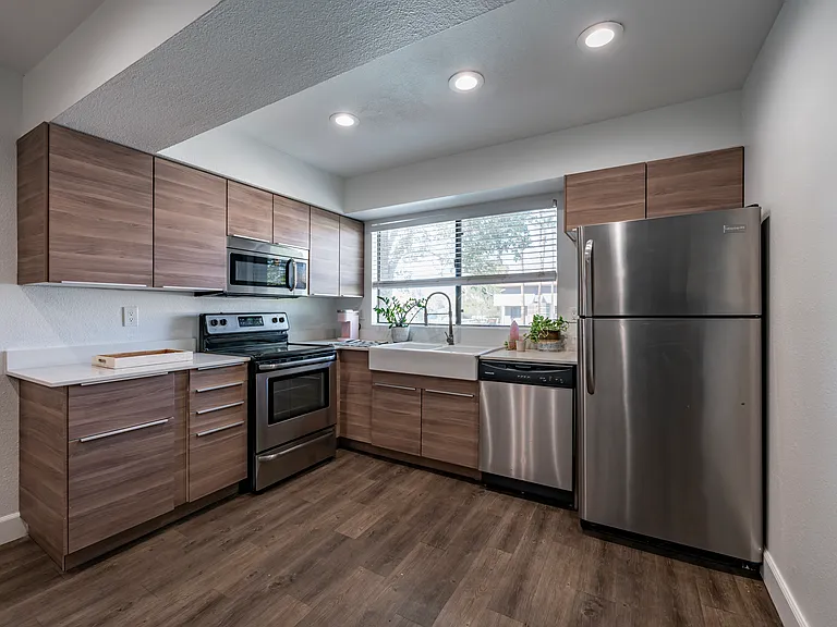 Our 2nd floor homes are remodeled with European wood look cabinetry and open lay out!