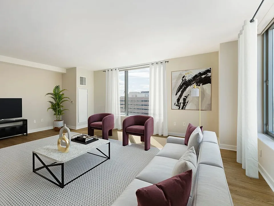 Renovated Package I living room with hard surface flooring