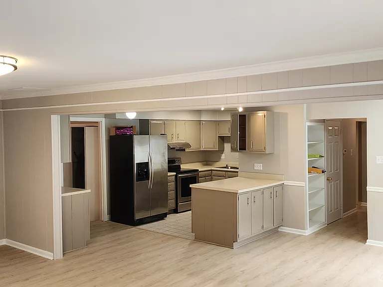 Open floor plan with spacious kitchen