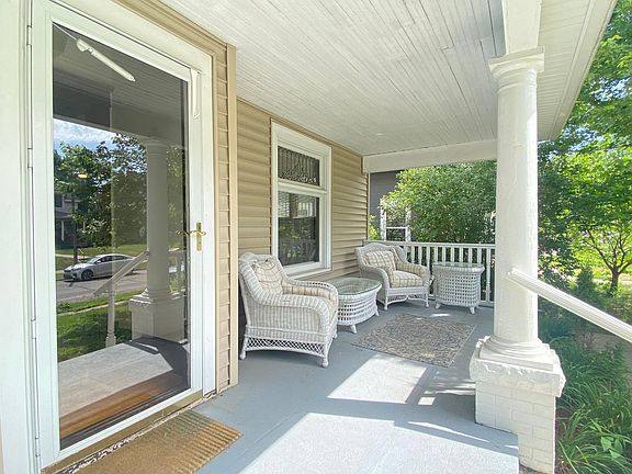 Beautiful covered porch for working at home and entertaining.