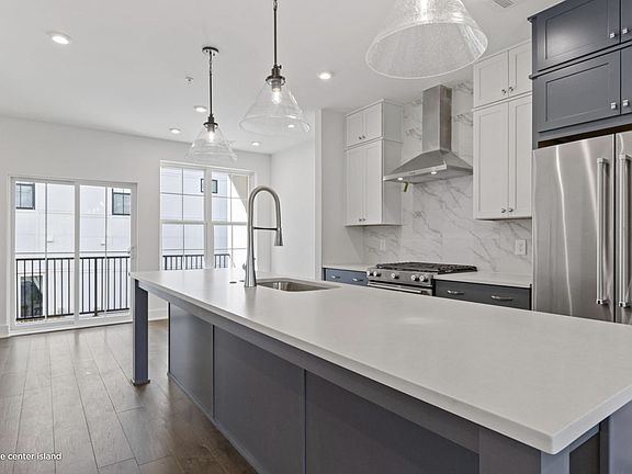 Designer Kitchen with gas stove.