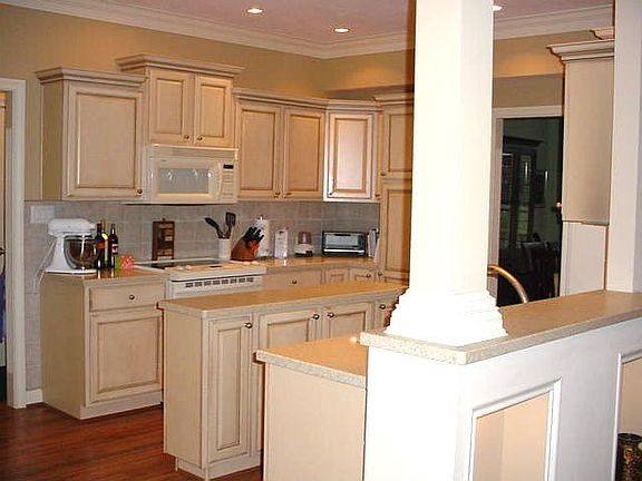 Laminate flooring, corian countertops