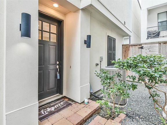 Lovely entrance to the home on the side of the townhome.