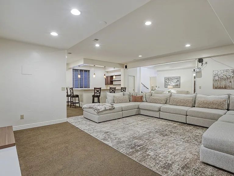 BASEMENT WITH HUGE SCREEN WITH PROJECTOR FOR WATCHING GAMES/MOVIES