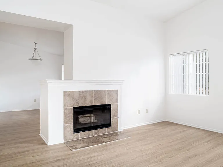Living Room with Fireplace and Hard Surface Flooring