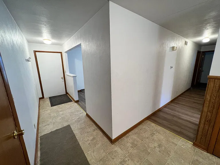 front door & hall view from dining area