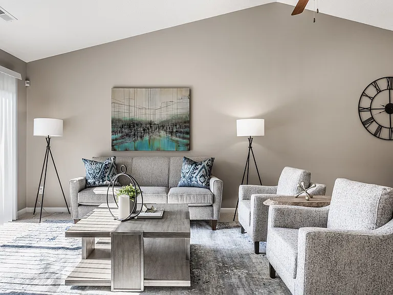 Step into a cozy living room at Wheaton Village, designed for relaxation and everyday comfort with a bright, inviting layout.